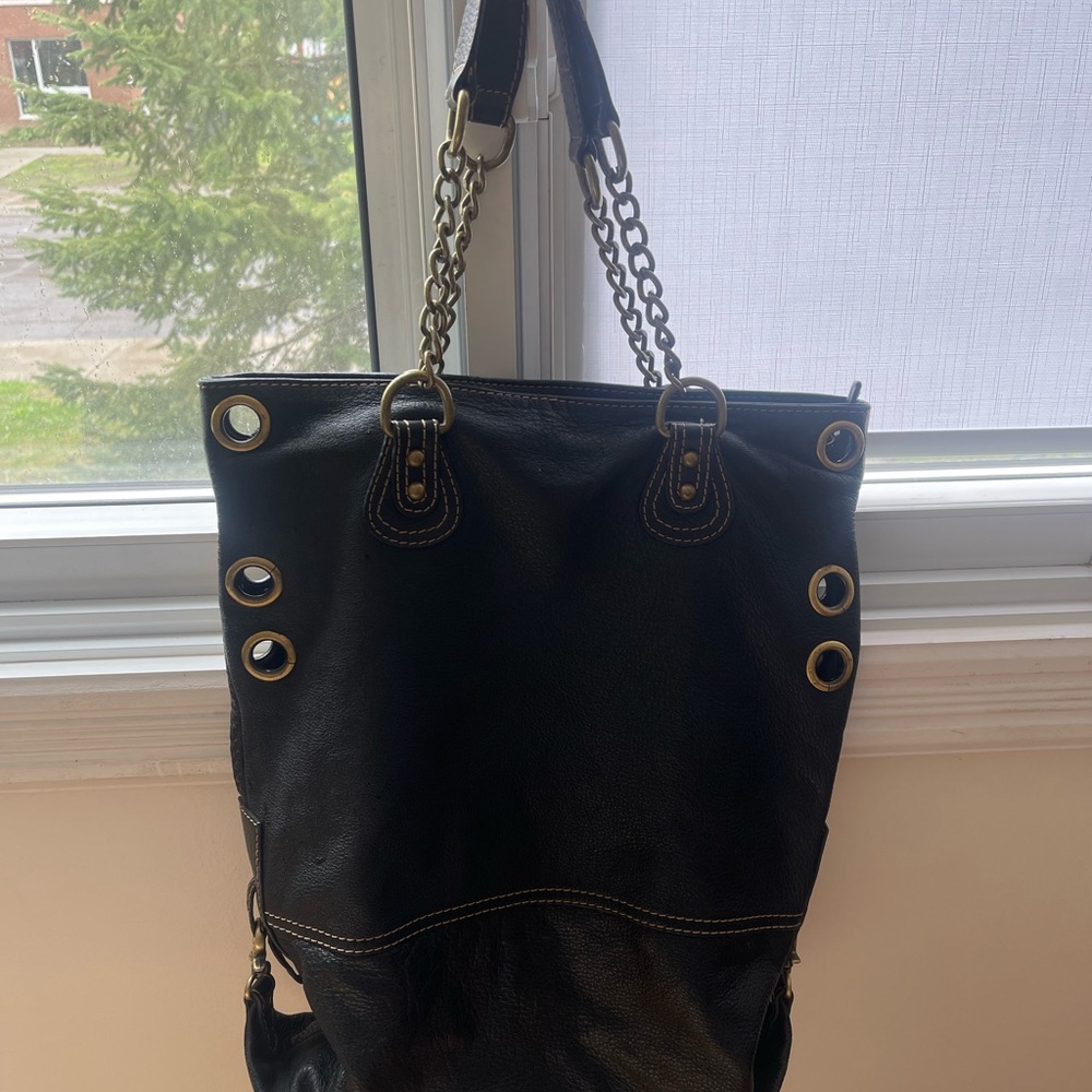 BCBG fashionable Lether bag for every day. on handles with chains and b…